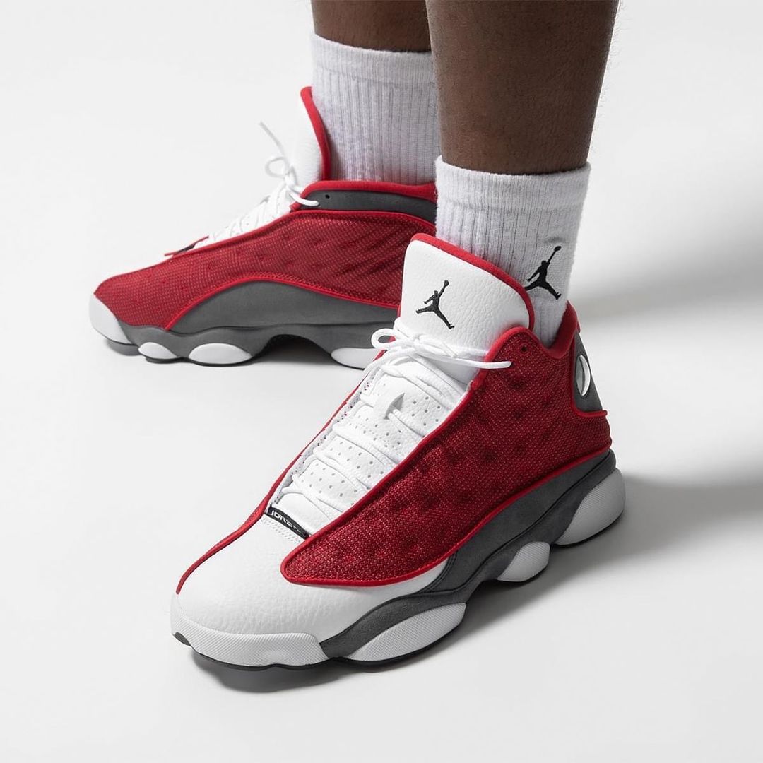 Air Jordan 13 Retro "Red Flint" sneakers in a gym red and flint grey