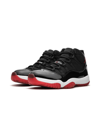 Air Jordan 11 Retro - Black / Red