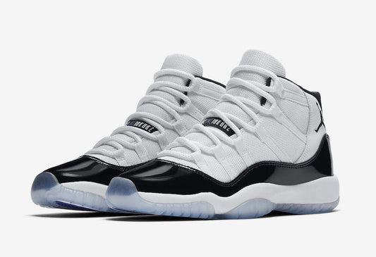 Air Jordan 11 Retro - White / Blue / Black