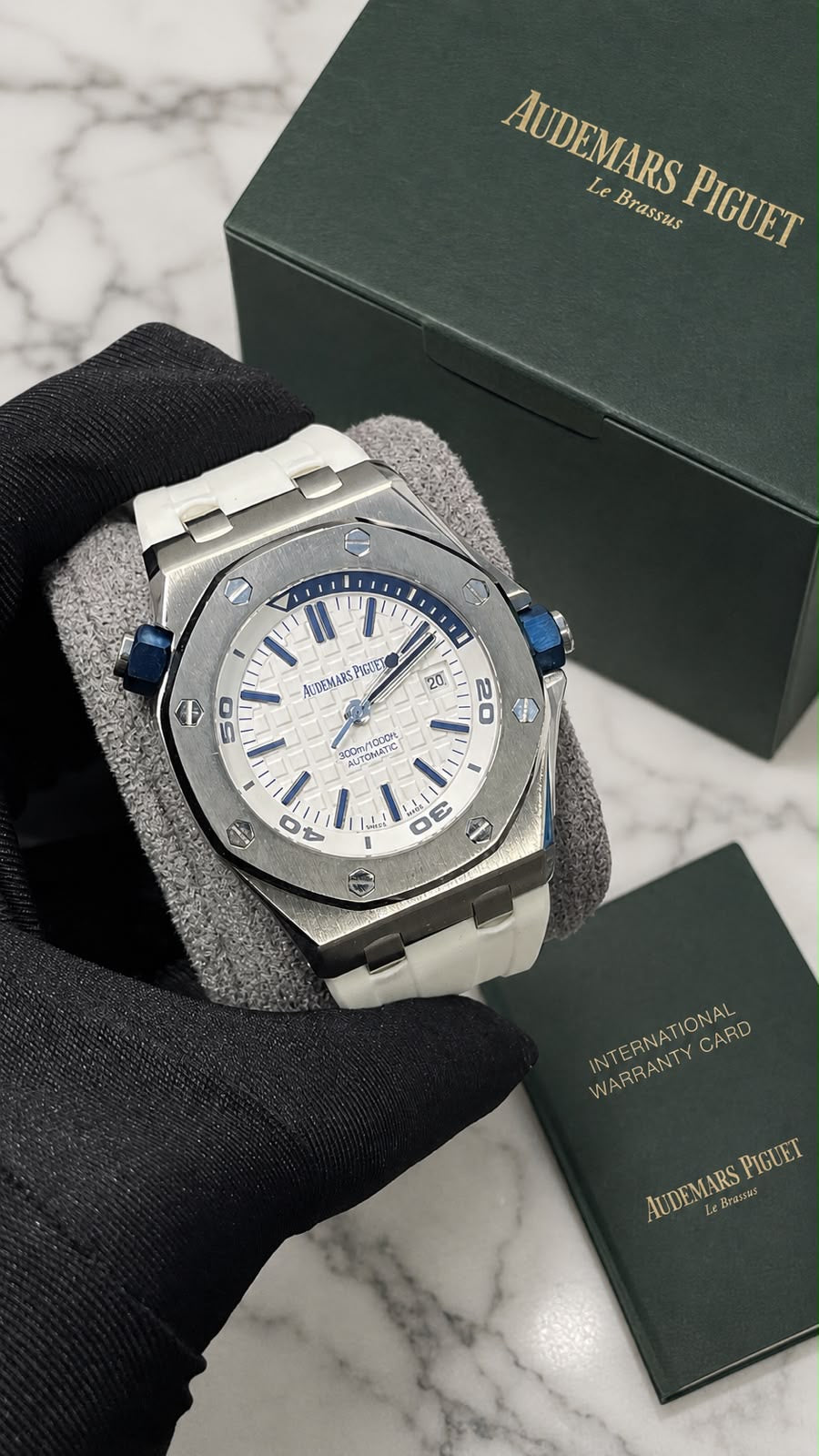 AP Royal Oak Offshore Diver with a white dial and rubber strap.