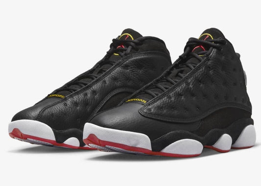 Air Jordan 13 Retro "Playoffs" sneakers in a black, red, and white colorway.