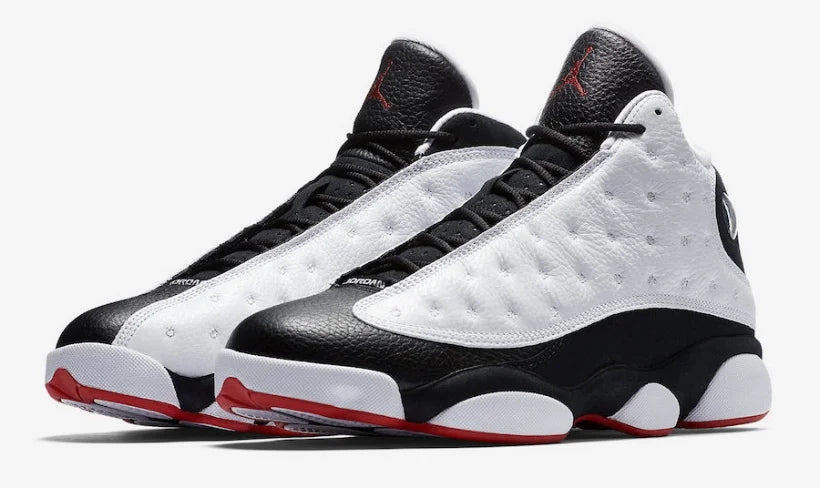 Air Jordan 13 Retro "He Got Game" sneakers in a white, black, and red